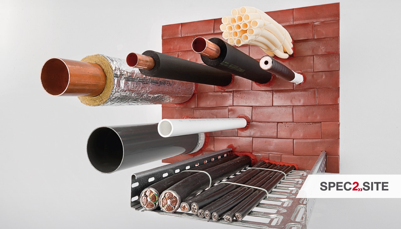 a variety of multidisciplinary penetrations passing through firestopping bricks